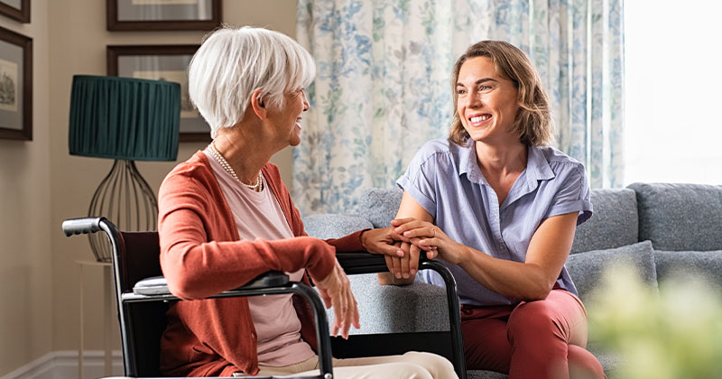 lady with woman in wheelchair